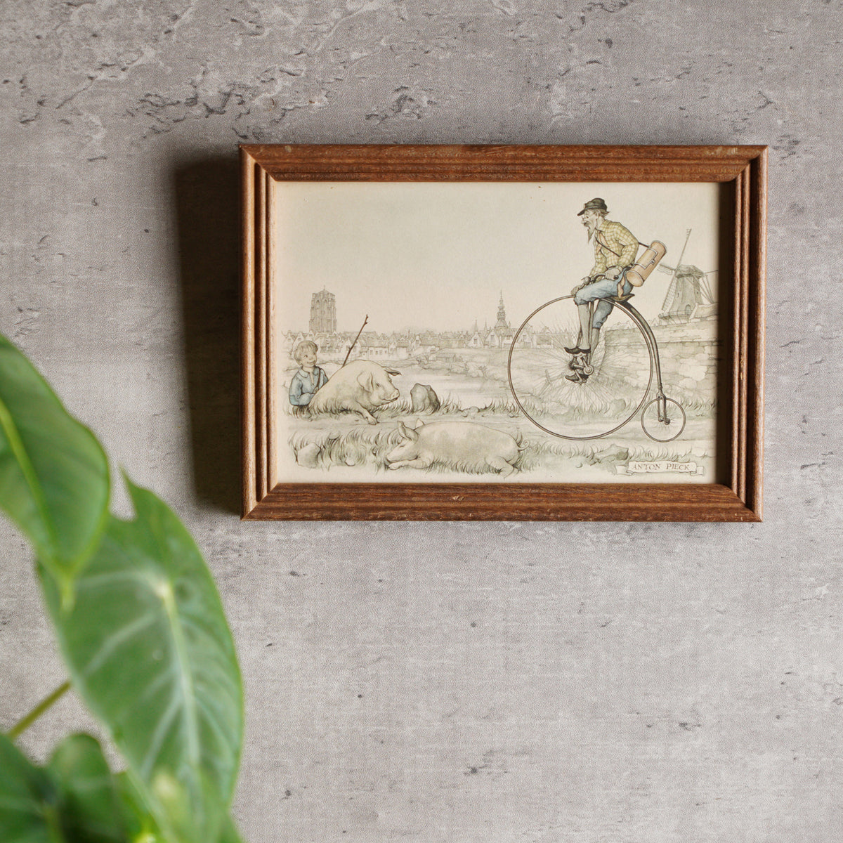 荷蘭Anton Pieck"豬與高輪單車"印刷掛畫