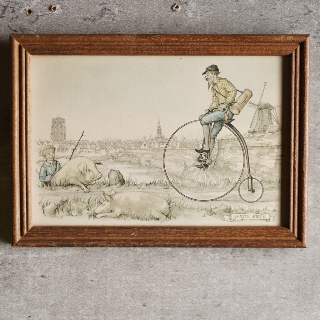 荷蘭Anton Pieck"豬與高輪單車"印刷掛畫